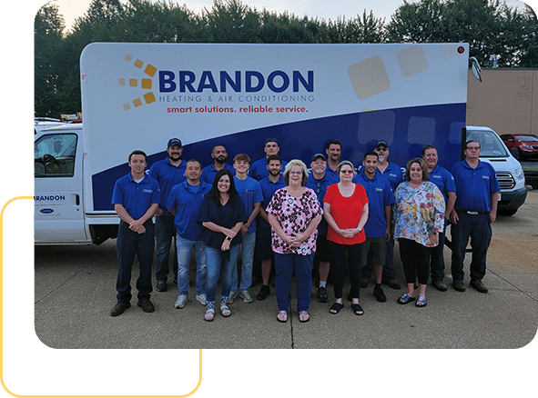 Brandon Heating & Air Conditioning team outside in from of a service.